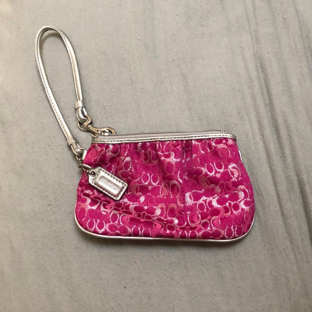 Pink and silver Coach wristlet